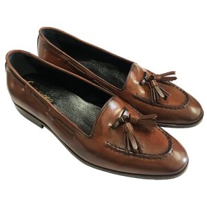 Mocassini con pon pon in vitello