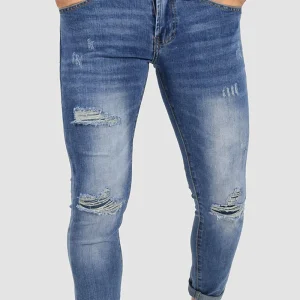 JEANS SKINNY CAPRI CON STRAPPI