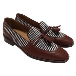 Mocassini in pelle e tessuto con nappine