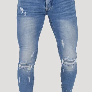 JEANS SKINNY CON STRAPPI