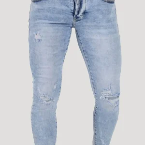 JEANS SKINNY CON STRAPPI