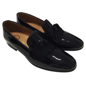 Mocassini in vernice con nappine