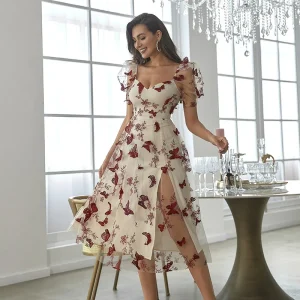 Abito lungo fiorato con spacco